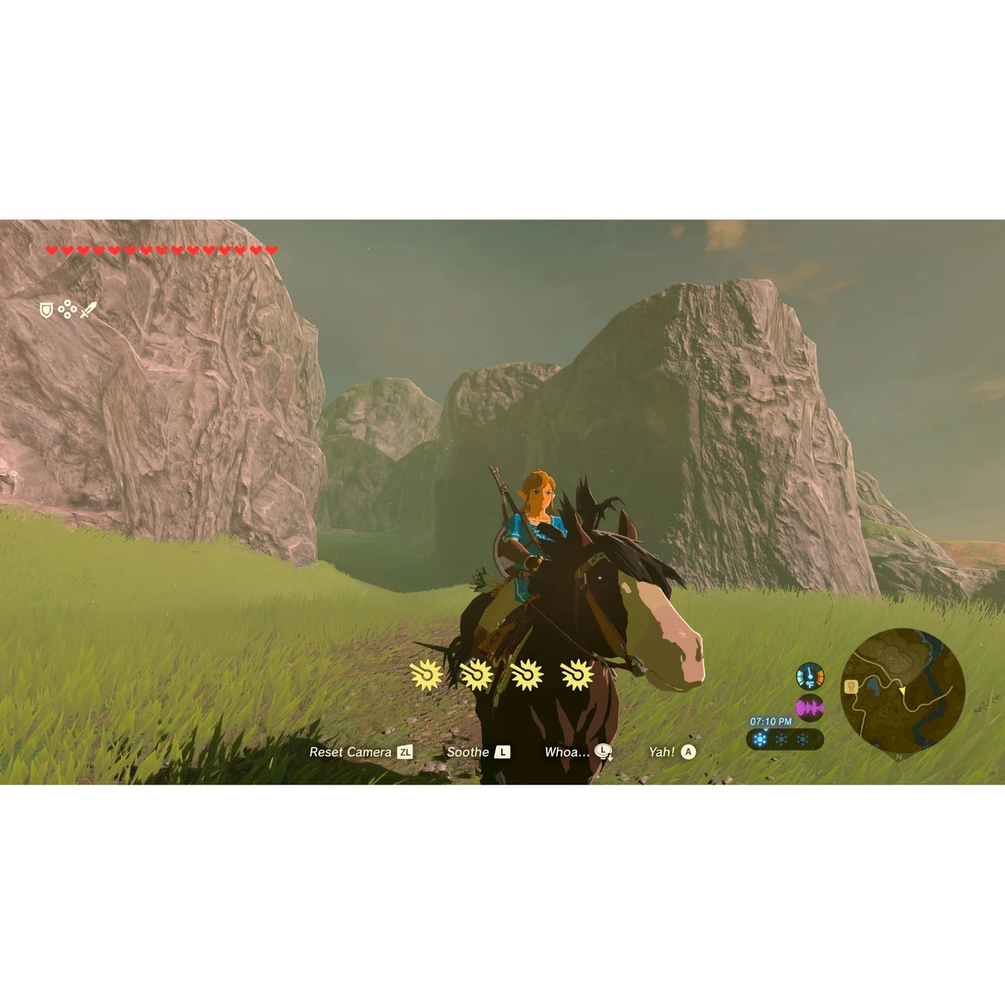 "In-game screenshot from The Legend of Zelda: Breath of the Wild – Nintendo Switch 2 Edition, showing Link riding Epona through a scenic landscape with mountains and lush greenery."