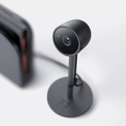 "Close-up view of the Nintendo Switch 2 Camera, showcasing its compact black design with a stand, ideal for seamless video chat and multiplayer gaming experiences."