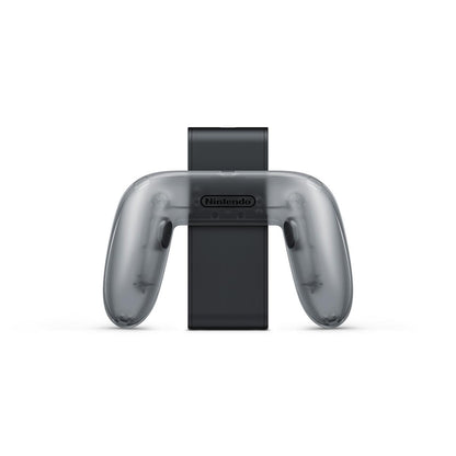 "Close-up view of the Nintendo Switch 2 Joy-Con 2 Charging Grip, showcasing its sleek black design with slots for attaching Joy-Con controllers, ensuring convenient charging."