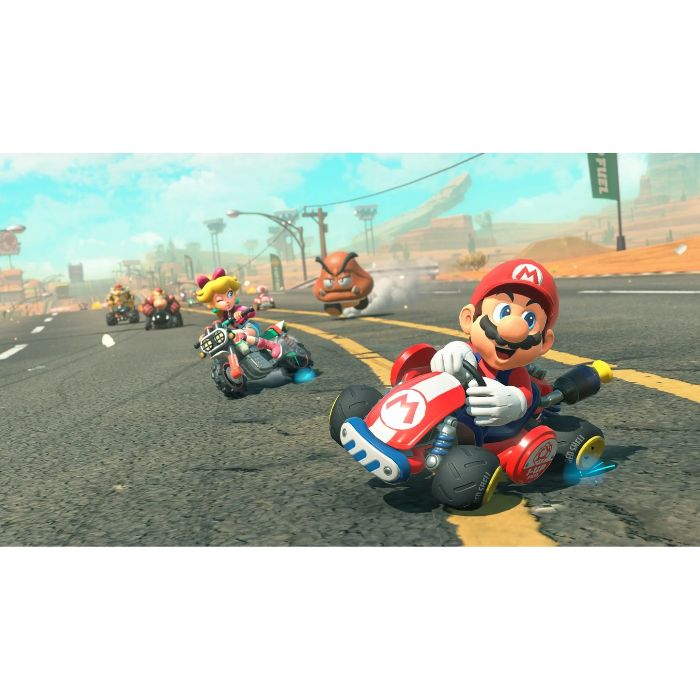 In-game screenshot from Mario Kart – Nintendo Switch 2 Edition, displaying characters navigating a grassy outdoor course with competitive racing gameplay.