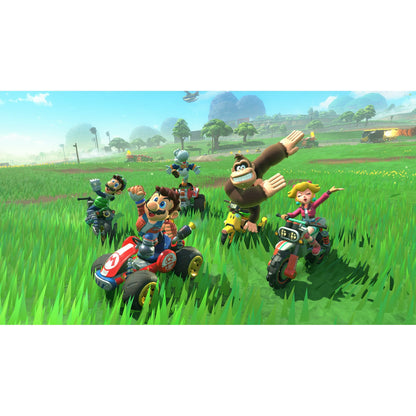 In-game screenshot from Mario Kart – Nintendo Switch 2 Edition, featuring characters racing through a bustling urban track with high-speed action.